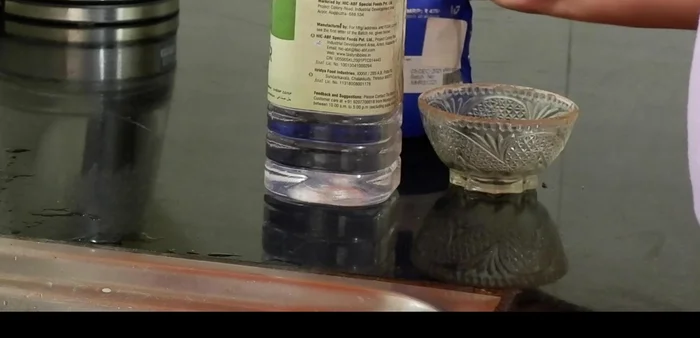 Apply the paste, leave it for half an hour, then scrape and clean with a brush, and wash with hot water.