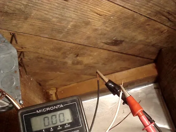 Once pulled through, connect the wires, and test for continuity.