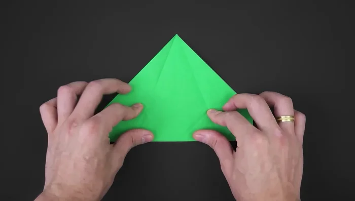 Unfold both, open the middle part, and fold the corners using the marks. Close the two sides.