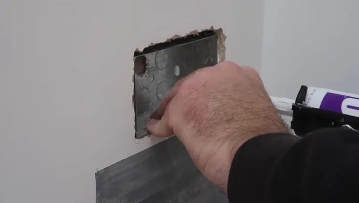 Allow the filler to cure overnight, then sand and paint the area.