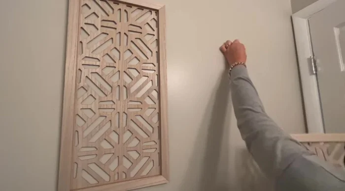 Add decorative twine to wall decor for extra flair.