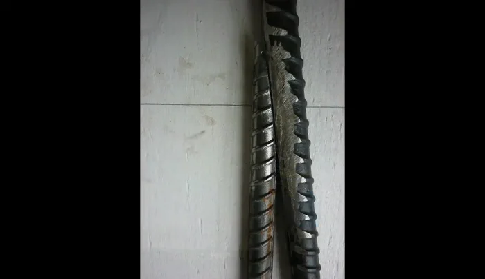 Customize and weld the rebar pieces that connect the trellis sections to the frame, accounting for non-square frame shapes.