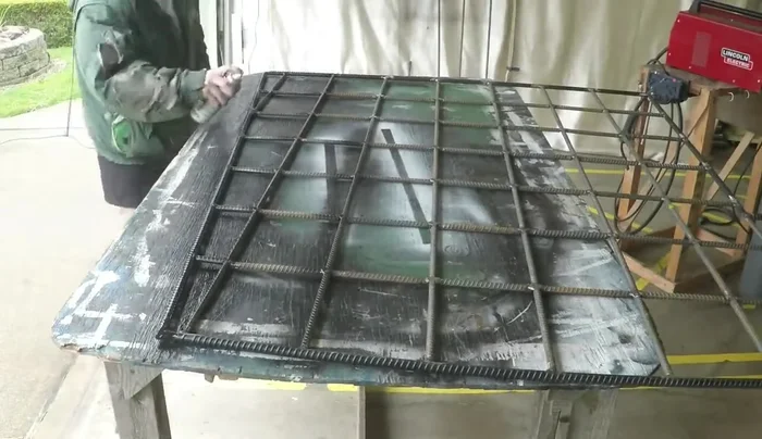 Install the completed trellis sections into the support brackets.