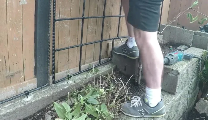 Install the completed trellis sections into the support brackets.