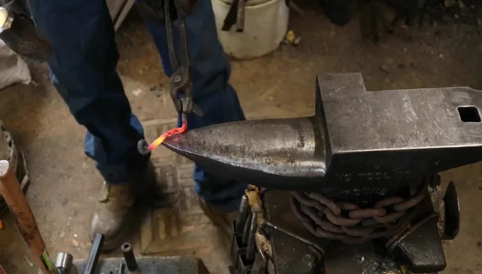 Bend the 2.5-inch section for wall mounting at a 45-degree angle, then curve to create the hook.