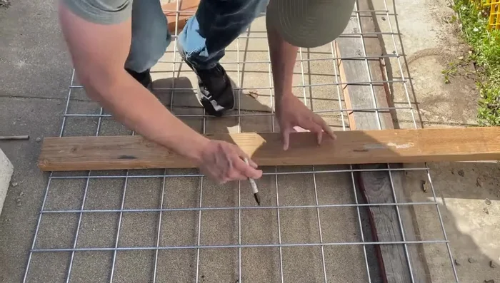 Cut cattle panels to size using an angle grinder (or bolt cutters). Wear safety gear!
