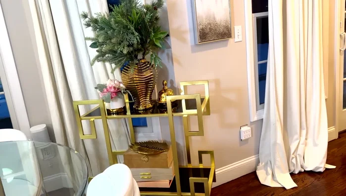 Style the bar cart with decorative items and accessories.