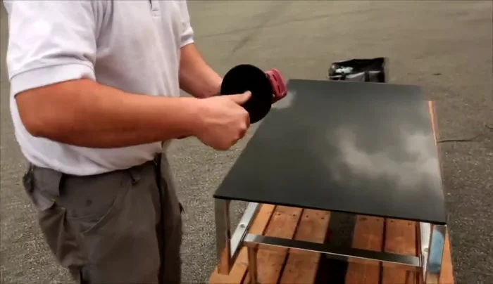 Use the red GP 150 grit abrasive to remove scratches. Apply small amount of water, slowing down over scratches and speeding up over scratch-free areas.