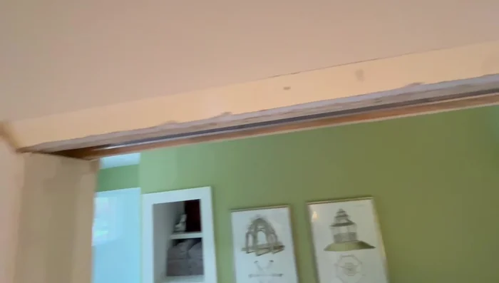 Check for any obstructions or binding and allow for homeowner to add trim.