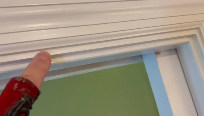 Remove the old door.