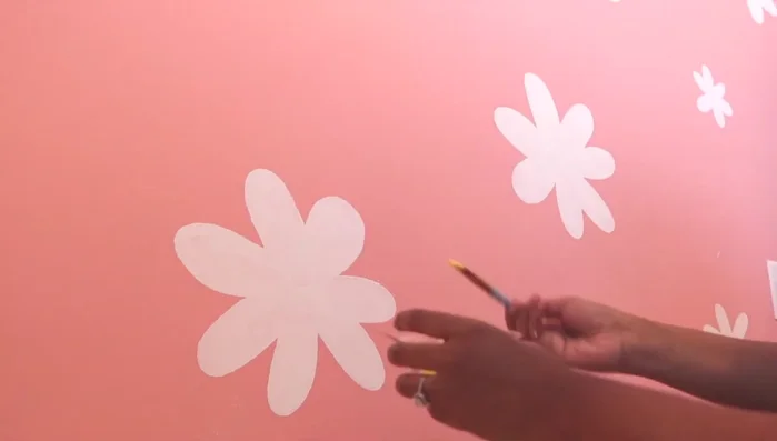 Add small yellow circles (mix white paint with golden yellow acrylic paint).