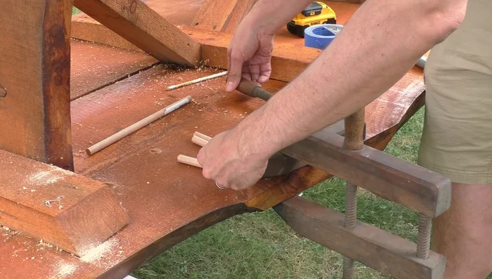 Cut a slit along the side of each dowel to prevent air pockets when gluing.