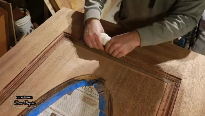 Clean up sanding marks. Using a paper towel to better conform sandpaper to details or steel wool is recommended for a finer finish.