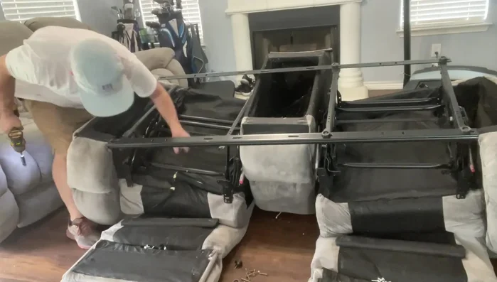 Disassemble the remaining parts of the mechanism to access the bent components.