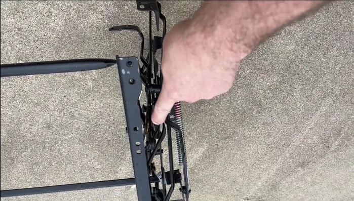 Disassemble the remaining parts of the mechanism to access the bent components.