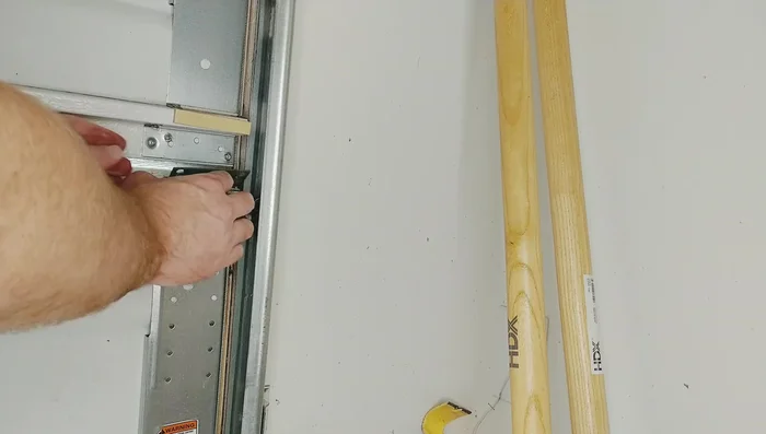 Reinstall the rollers and hinges, ensuring proper alignment.