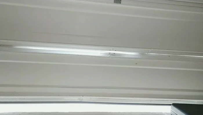 Address any remaining bulges or misalignments using a hammer and dowel rod.