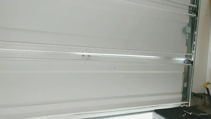 Address any remaining bulges or misalignments using a hammer and dowel rod.