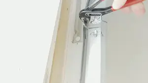 DIY Garage Door Repair: Fixing Bent Rollers and Misaligned Tracks