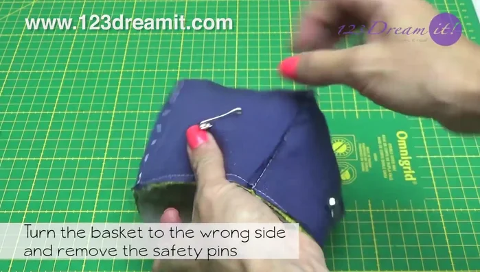 Turn the basket wrong side out, remove safety pins, and remove the basting stitches. Turn everything inside out.