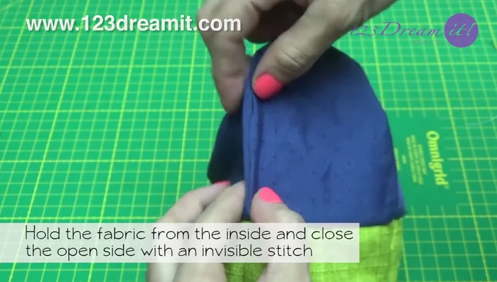 Close the open side with an invisible stitch, working from the inside.