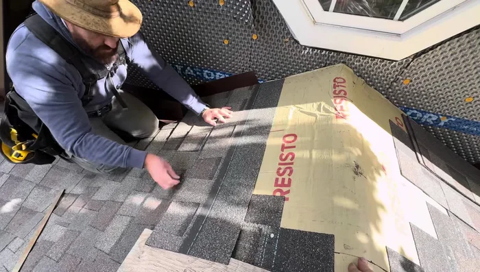 Install the shingle over the step flashing, securing with roofing nails. Position step flashing to minimize visibility.