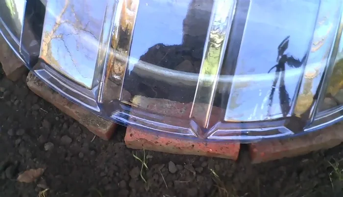 Fill gaps with additional bricks, creating a complete seal.