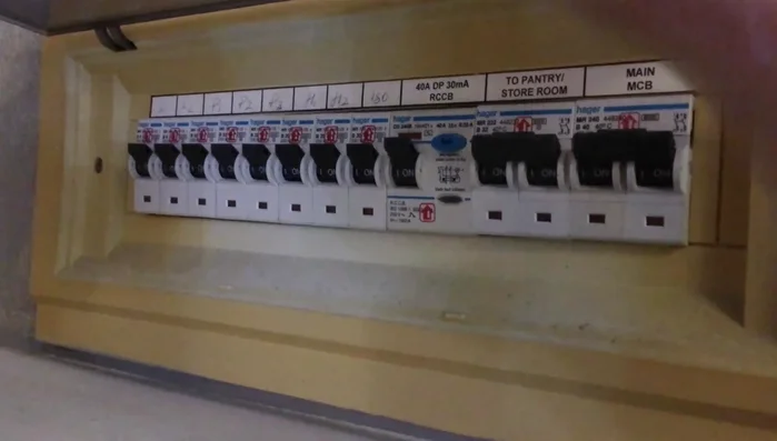 Locate the circuit breaker panel and identify the correct breaker (indicated by a light or by testing each breaker).