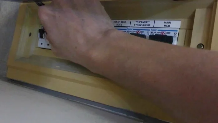 Test the new socket by plugging in a lamp and checking for consistent power.