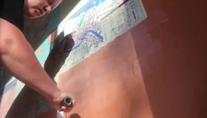 Use a dense foam roller (or brayer) to smooth out the maps and remove air bubbles.