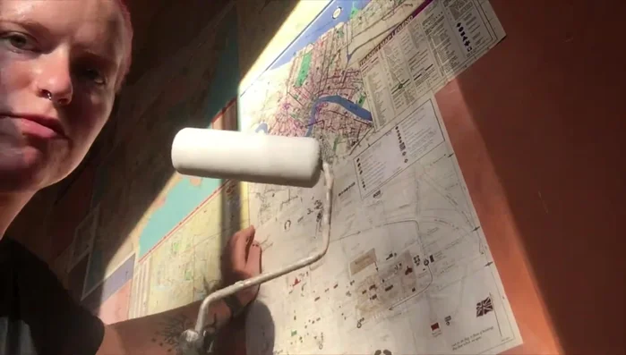 Use a dense foam roller (or brayer) to smooth out the maps and remove air bubbles.