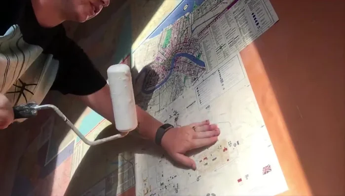 Apply a watered-down coat of Mod Podge to seal and protect the maps.