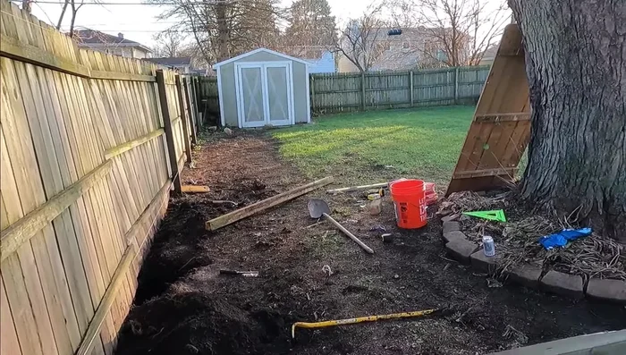 Position the new 4x4 post precisely using the string line as a guide, and fill the hole with the concrete mixture.