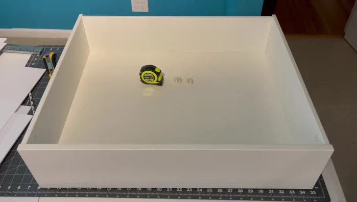 Clean drawer surfaces with alcohol (avoiding foam board).