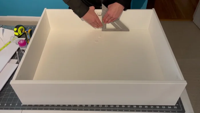 Attach side dividers using cord clips.