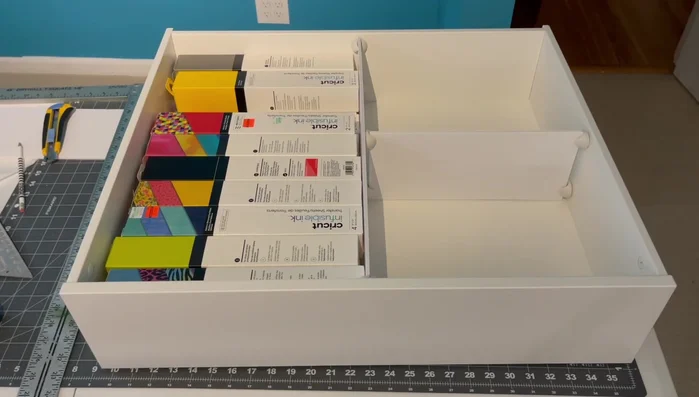 Organize craft supplies within the created dividers.