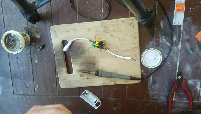 Solder the new capacitor in place.