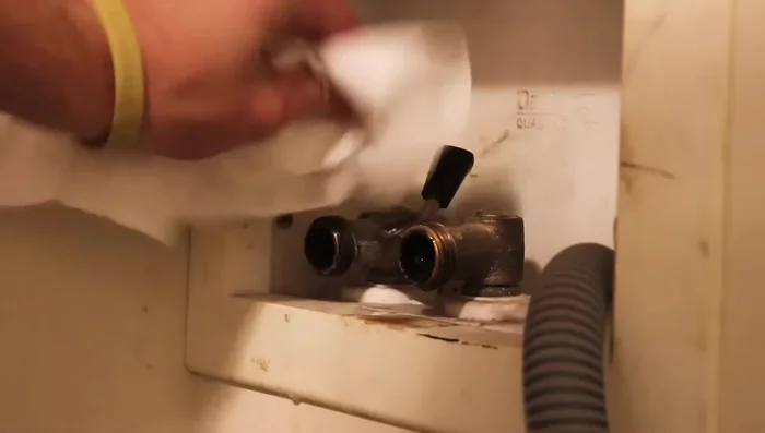 Install washers onto the ends of the new hoses.