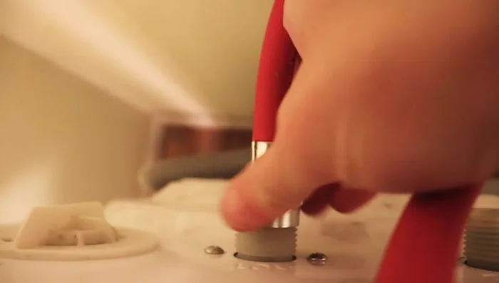 Tighten the hoses further using channel-lock pliers if necessary, ensuring they are snug (about a half-turn after snug).