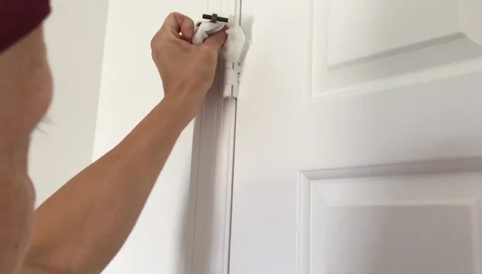 Open and close the door several times to distribute the grease and ensure smooth operation.