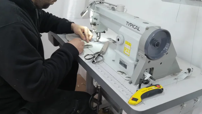 Attach top to cushion: Line up the center point and stitch. Maintain tension for a neat, professional finish.