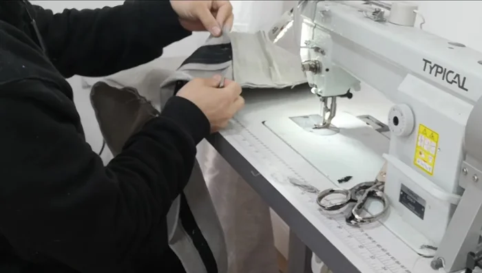 Attach top to cushion: Line up the center point and stitch. Maintain tension for a neat, professional finish.