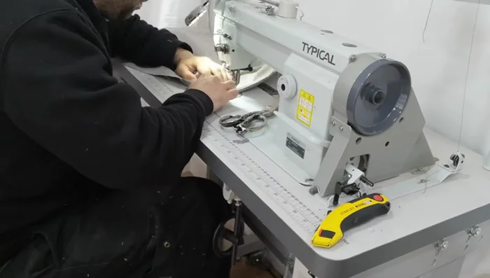 Attach top to cushion: Line up the center point and stitch. Maintain tension for a neat, professional finish.