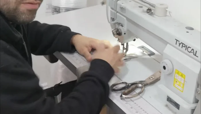 Join piping ends: Overlap the piping ends, and fold them back on themselves to create a neat join, then sew.