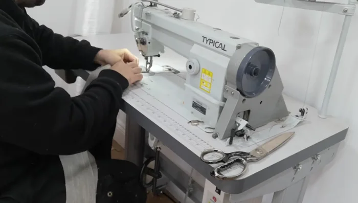 Make up zip borders: Fold over three-quarters of an inch, stitch, and use an overlocker to clean up the edges.