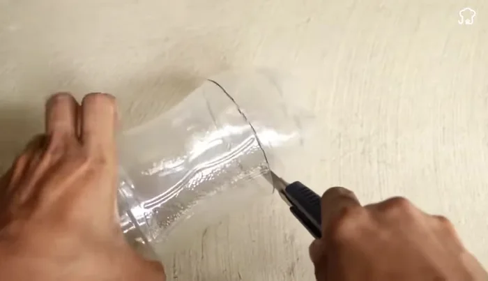 Prepare the rubber piece: Make a hole in the center of a circular rubber piece (using a soldering iron)