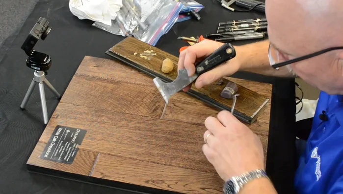 If needed, use a dental pick or five-way tool to add grain details.