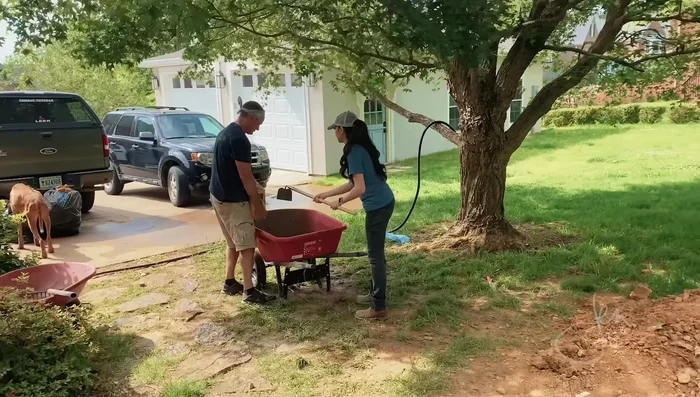 Pour the concrete footing: Use a sufficient amount of concrete mix (54-80 pound bags in this case). Consider adding steel mesh reinforcement for extra strength.