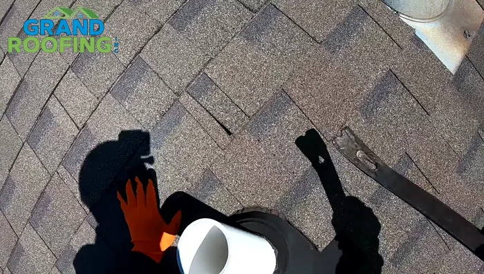 If necessary, cut the old shingles to remove the pipe boot completely. Avoid cutting into the drip groove.