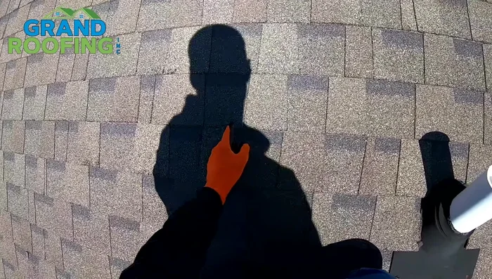 If necessary, cut the old shingles to remove the pipe boot completely. Avoid cutting into the drip groove.